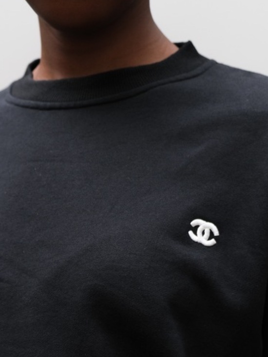 CHANEL Sweaters - Chanel Uniform Logo Sweatshirt. Embroidered Chanel logo, Rubber Chanel appliqué
